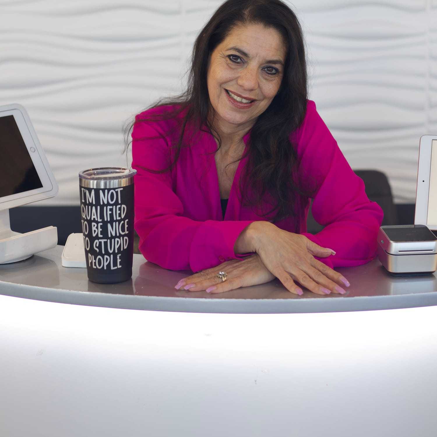 Portrait of Annie, a professional stylist at Illusions Salon & Spa, showcasing their expertise and style.