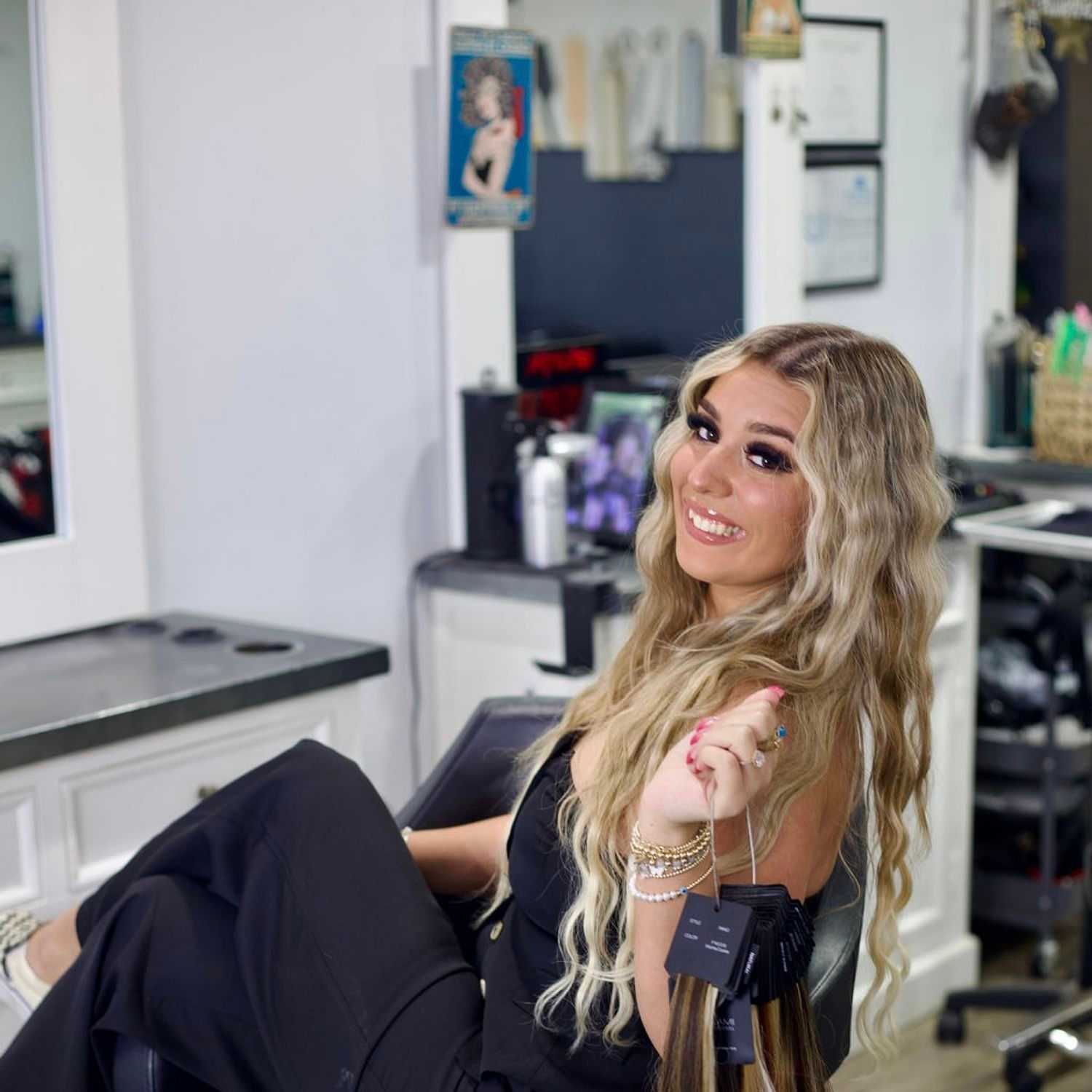 Portrait of Adrianna, a professional stylist at Illusions Salon & Spa, showcasing their expertise and style.