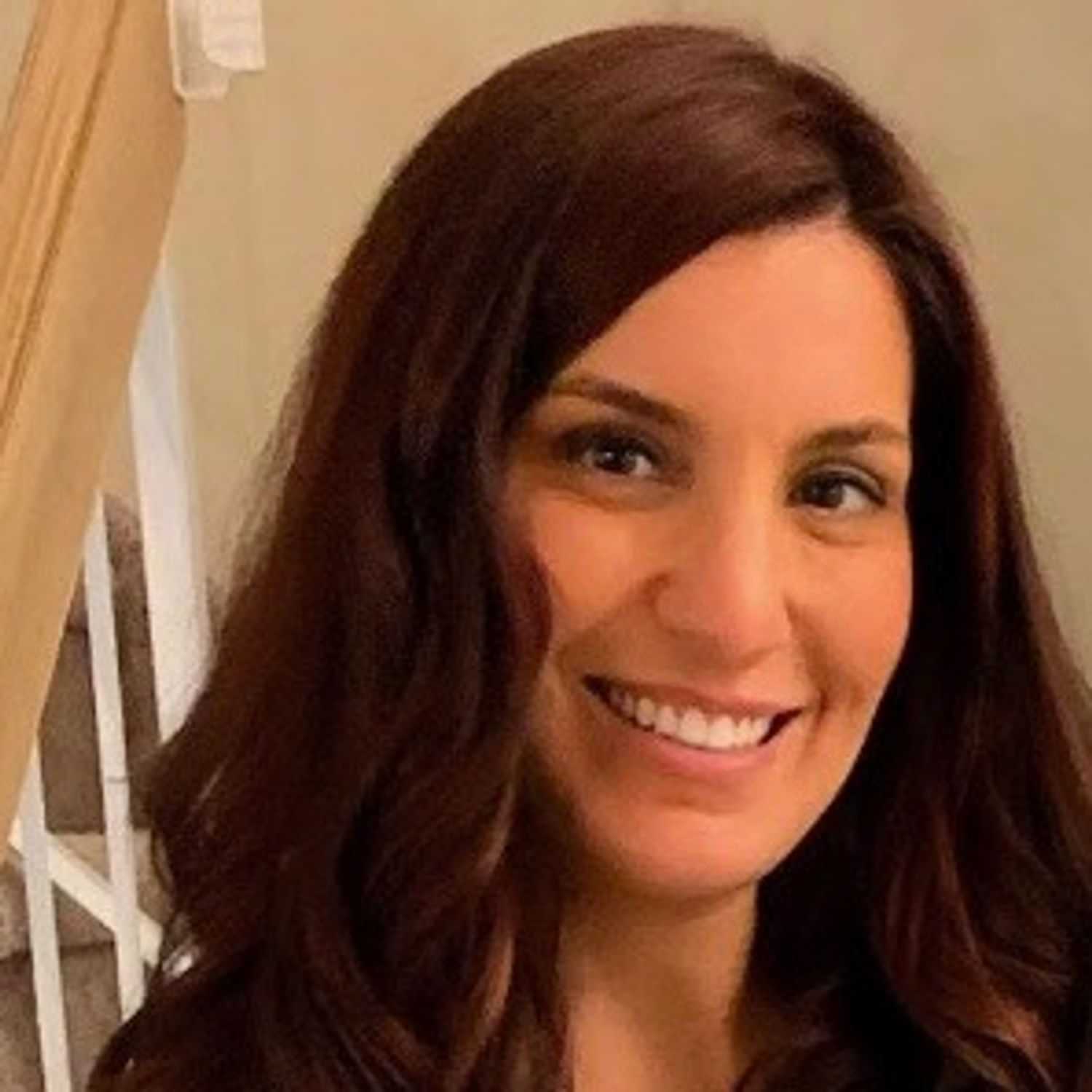 Portrait of Jordan Leporino, a professional stylist at Illusions Salon & Spa, showcasing their expertise and style.