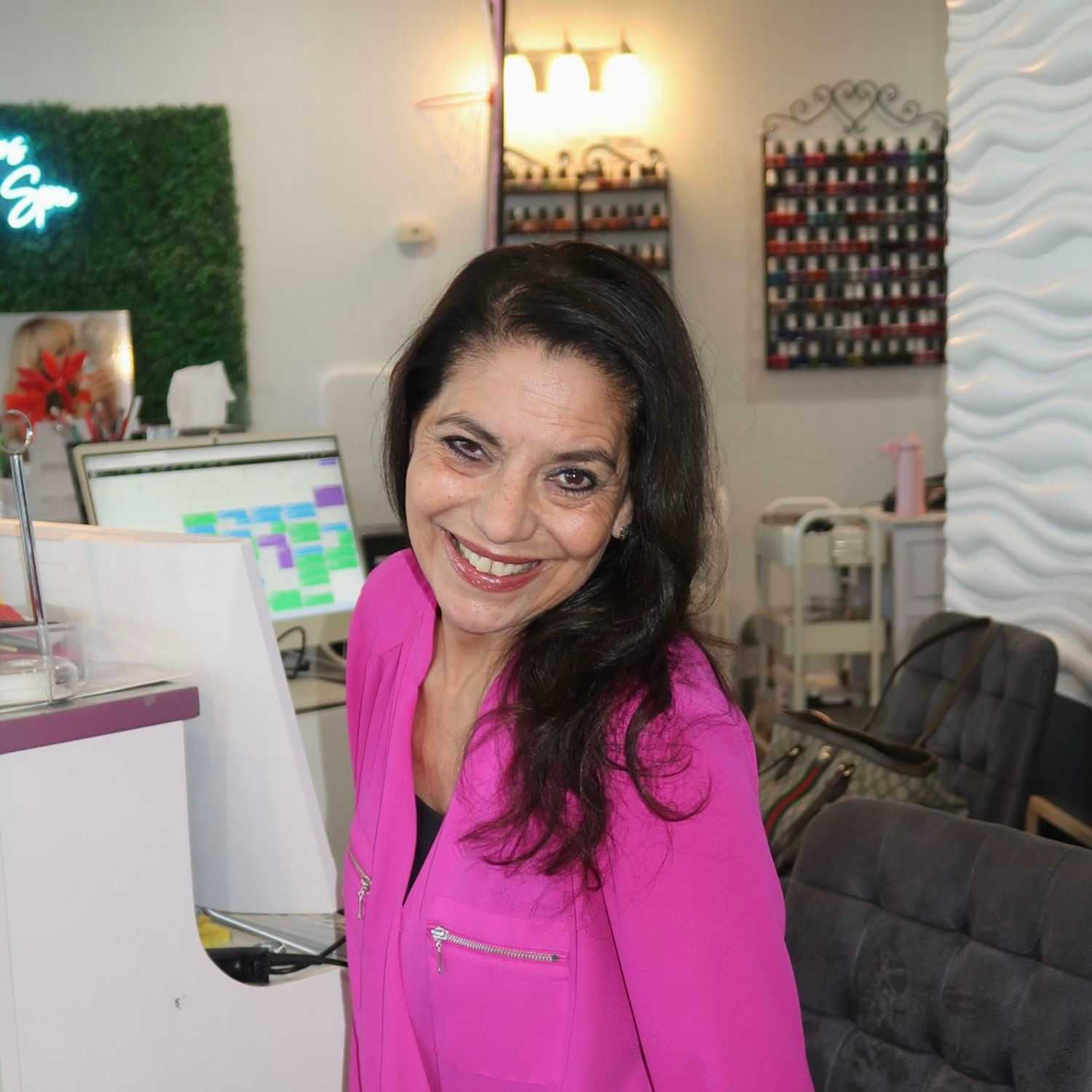 Portrait of Annie, a professional stylist at Illusions Salon & Spa, showcasing their expertise and style.