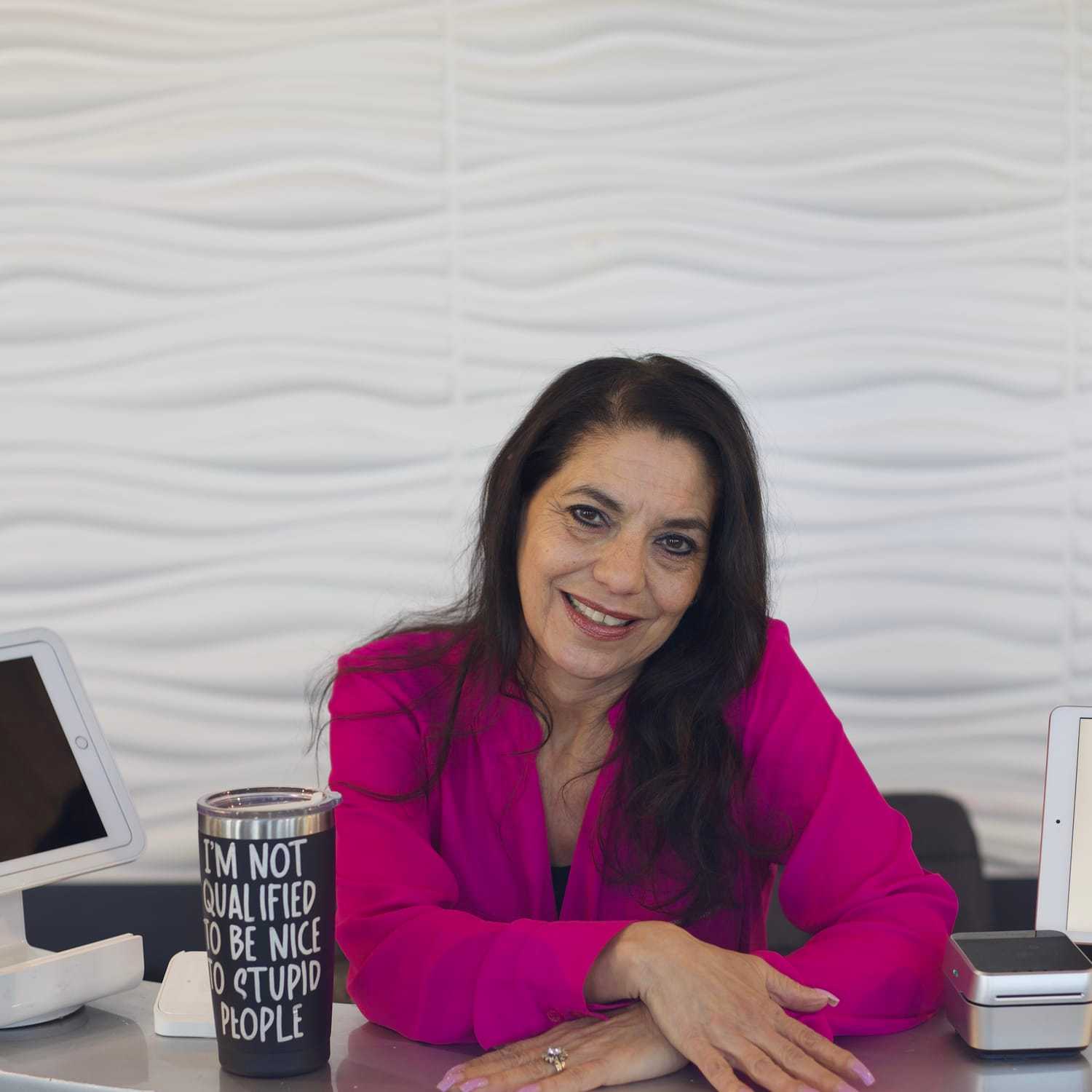 Portrait of Annie, a professional stylist at Illusions Salon & Spa, showcasing their expertise and style.