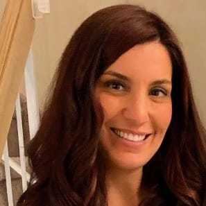 Portrait of Jordan Leporino, a professional stylist at Illusions Salon & Spa, showcasing their expertise and style.