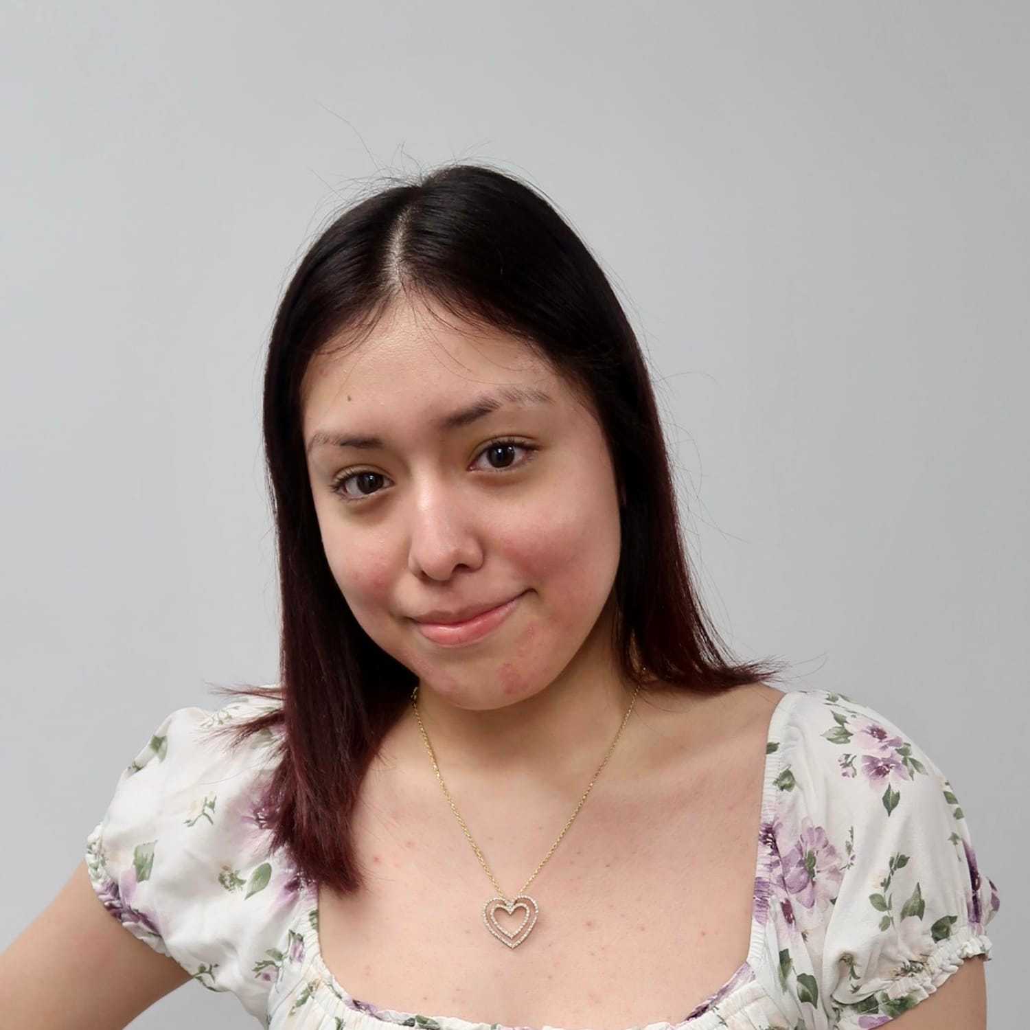 Portrait of Maritza, a professional stylist at Illusions Salon & Spa, showcasing their expertise and style.